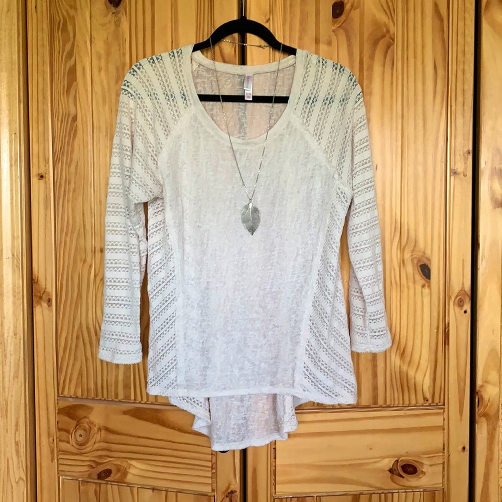 Cream lacy/crochet flowy high low top